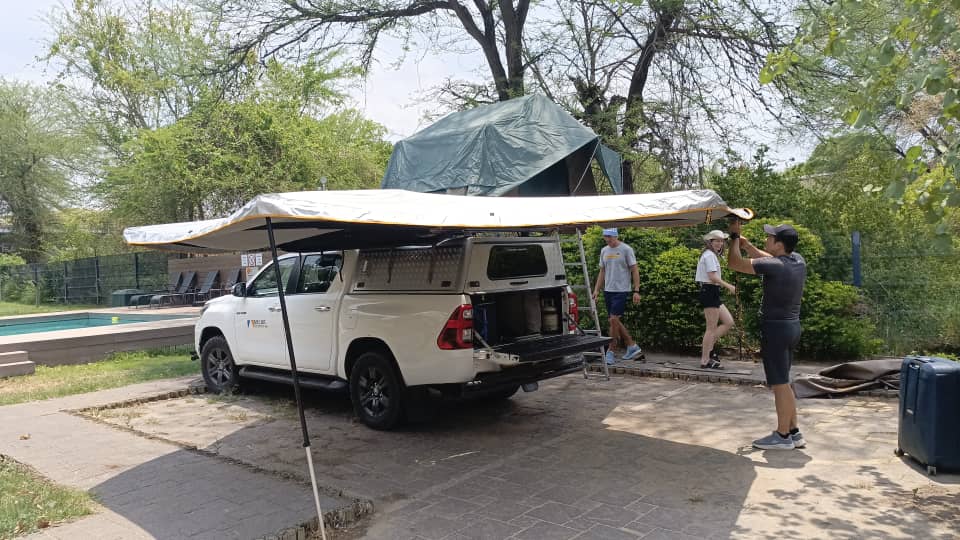 Hilux with rooftop tent set up